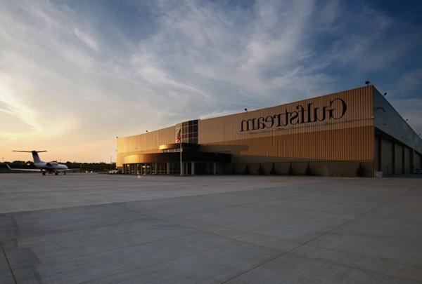 Gulfstream hangar with airplane parked out front.